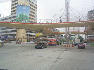 Suspended Pedestrian Crosswalks Above City Intersections