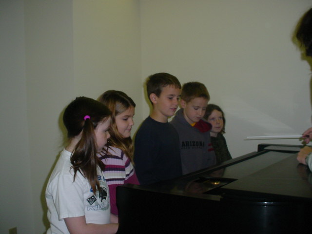kids on the piano